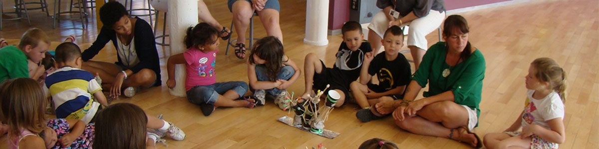 Group of students participate in an artmaking activity